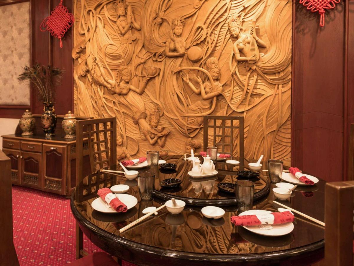 Hotel Mercure Alger Aeroport Maison Blanche Экстерьер фото A table set for dim sum